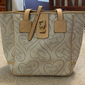 Dooney &Bourke Purple Hearts. Never used leather is amazing.